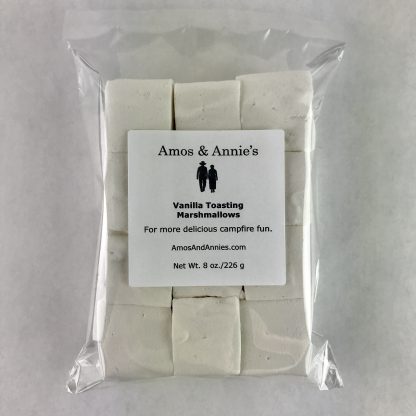 Twelve vanilla marshmallows for toasting packaged in a clear bag setting on a white background.